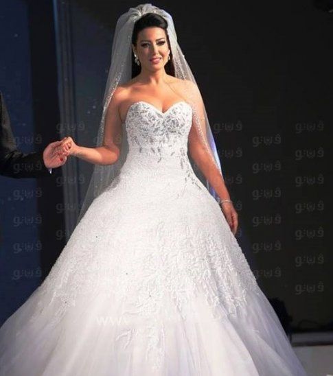 صور اجمل فساتين زفاف مرصعة بالالماس