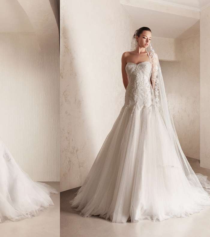 بين فستان الزفاف العاري والمستّر، ماذا تختارين؟