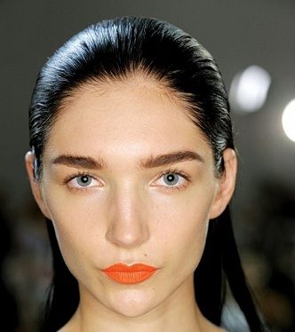 البرتقالي مع جون غاليانو و DKNY