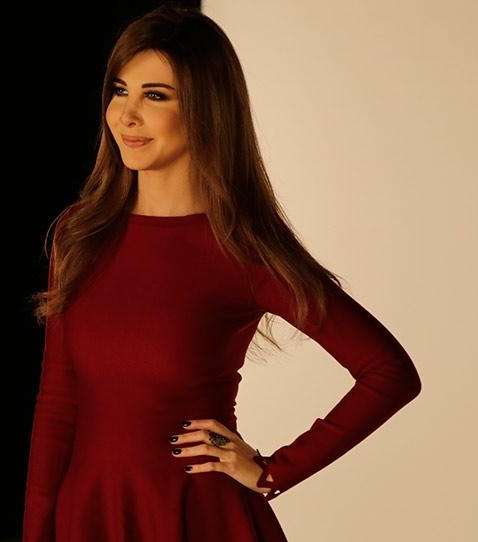 نانسي عجرم في الصورة الإعلانيّة المروّجة للموسم الأوّل من ذا فويس كيدز