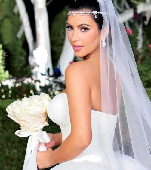 هكذا ظهرت كيم في حفل زفافها السابق..فماذا ينتظرنا هذه المرة؟