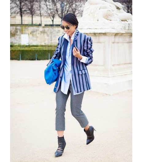 من أبرز طرق ارتداء القميص بأزرار، أن ترتديه مع السراويل المطبّعة