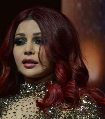 هيفاء وهبي تستقبل العام 2014 بالشعر الأحمر البرغندي