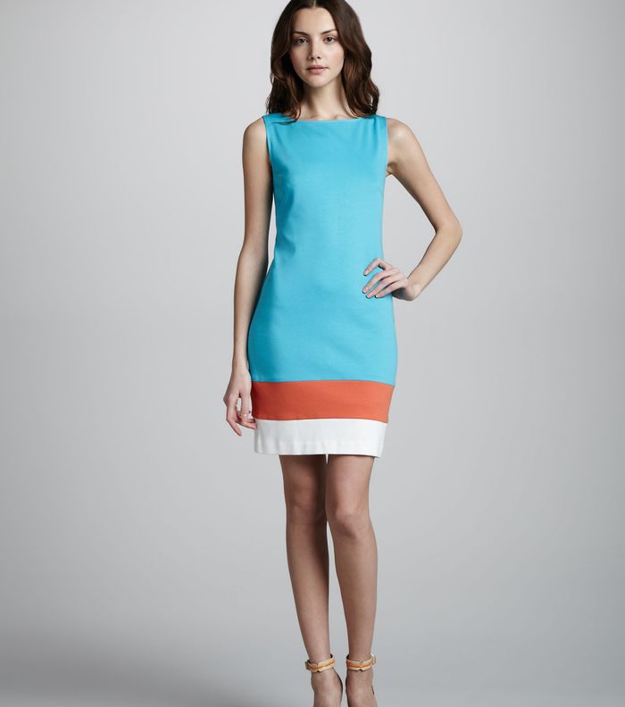 لإطلالة أكثر عصرية في العمل، إختاري فستان ذو لون زاه 