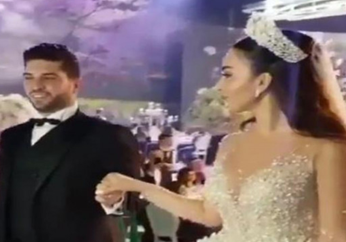 صور العروس والعريس ولو غير واضحة!