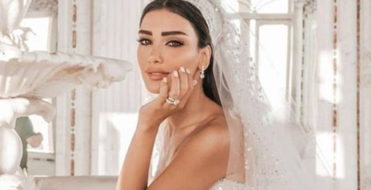 إطلالة زفاف ملوكية لجيسيكا عازار بفستان إيلي صعب وحضور لافت لأصالة!