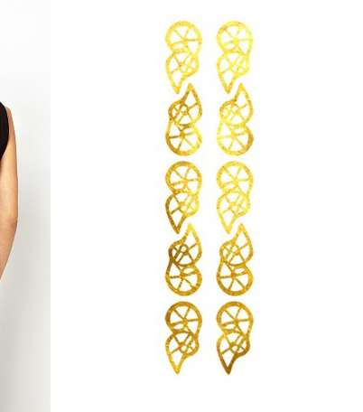 من الصيحات التي تناسب وشوم Instant 24، الفساتين المكشوفة على الظهر