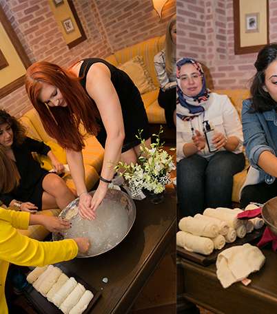 ضيوف الحفل يجربّن مستحضرات بيوريه 