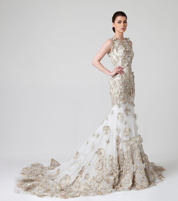 كسر كلاسيكية الأبيض مع فساتين زفاف راني زاخم 
