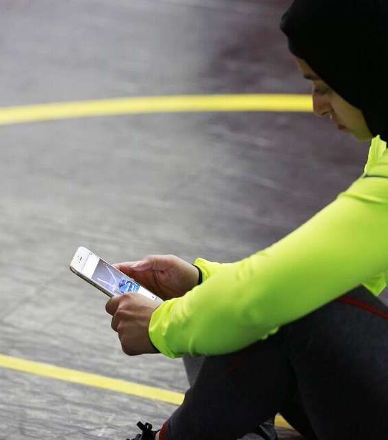 رافعة الأثقال الإماراتية تتدرب مع تطبيق Nike+ Training Club