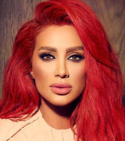 في مناسبة عيد الحب 2013، مايا دياب تختار الشعر الأحمر الجذاب