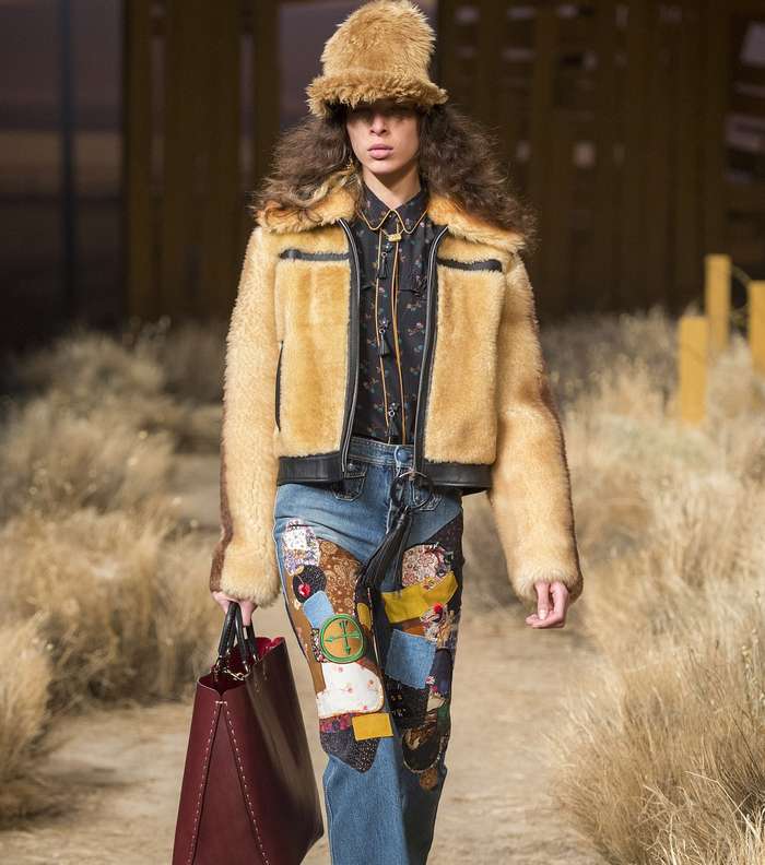 الجينز المطبع باسلوب الـ Patchwork من Coach 1941