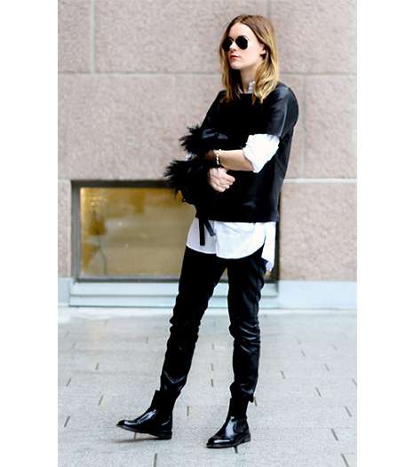 اعتمدي هذا الموسم، موضة القميص الأبيض وارتديه مع السترات والسراويل الجلدية