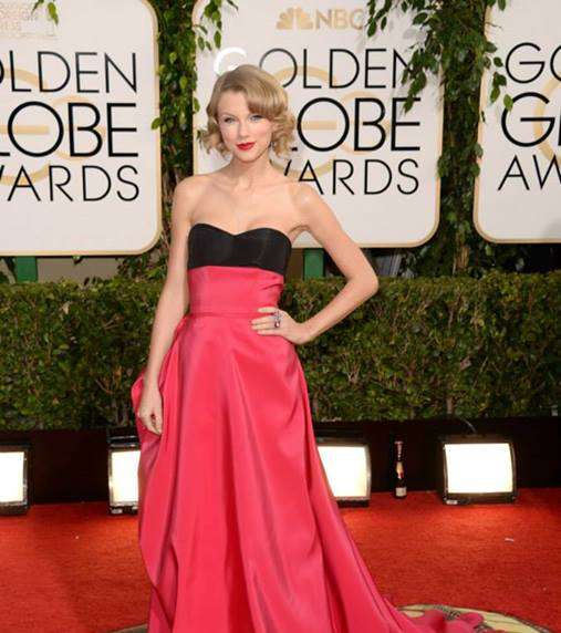 تايلور سويفت تتألق بفستان من توقيع كارولينا هيريرا في حفل الغولدن غلوب 2014