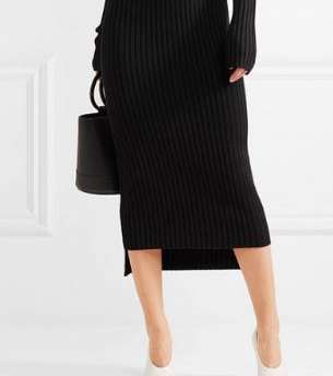 استبدلي الاوفرول الشورت Romper بفساتين متوسطة الطول في عمر الثلاثين