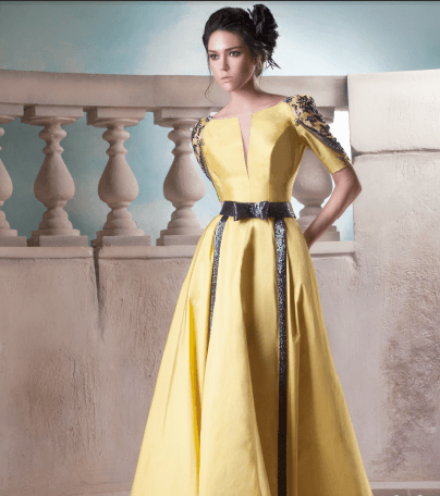 فستان مميز باللون الاصفر من توقيع حنا توما من مجموعة الازياء الراقية لصيف 2015