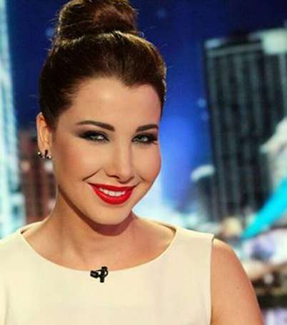 شاهدي الصور الاولى  لمكياج وشعر نانسي عجرم 2014 في آراب آيدول في الموسم الثالث 