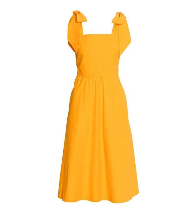 الفستان الضيق على الخصر مع اكمام العقدة على الاكتاف من H&M لصيف 2017 باللون الاصفر