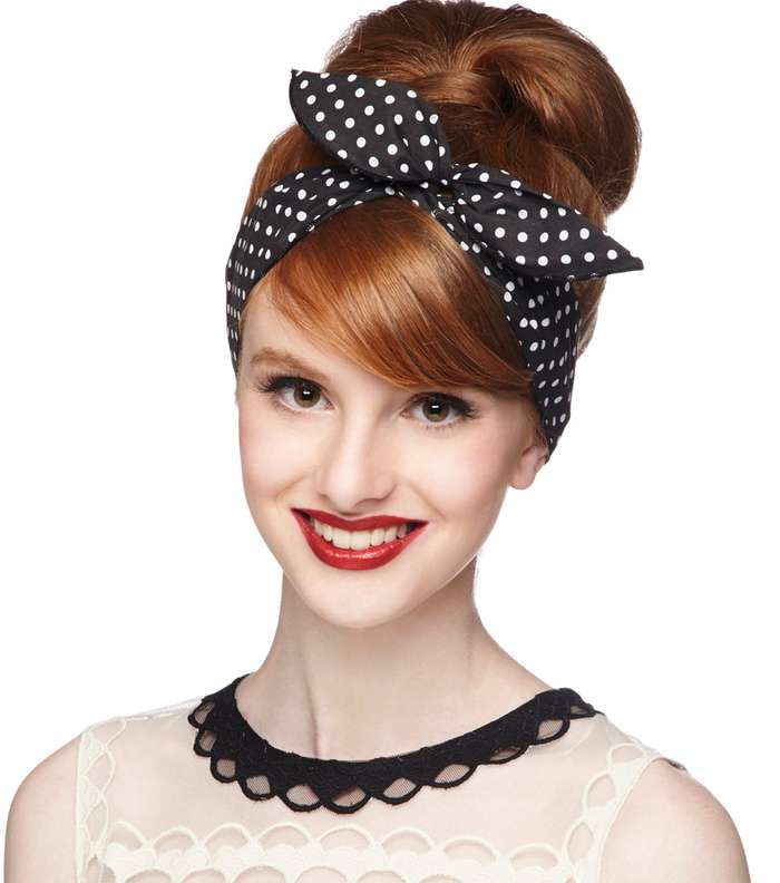 اعتمدي في صيف 2014 رباط الشعر على شكل عقدة على الرأس