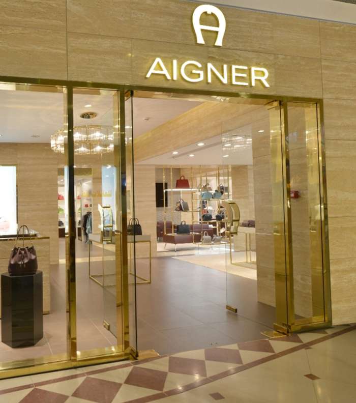 تعرفي بالصور، على متاجر علامة Aigner الجديدة في الرياض وجدة