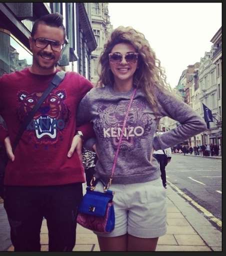 ميريام فارس تتسوق في لندن مع رامي قاضي وترتدي كنزة Kenzo
