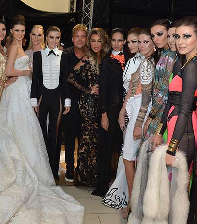 صور عرض ازياء نيكولا جبران في مركز إنفنيتي للسيارات