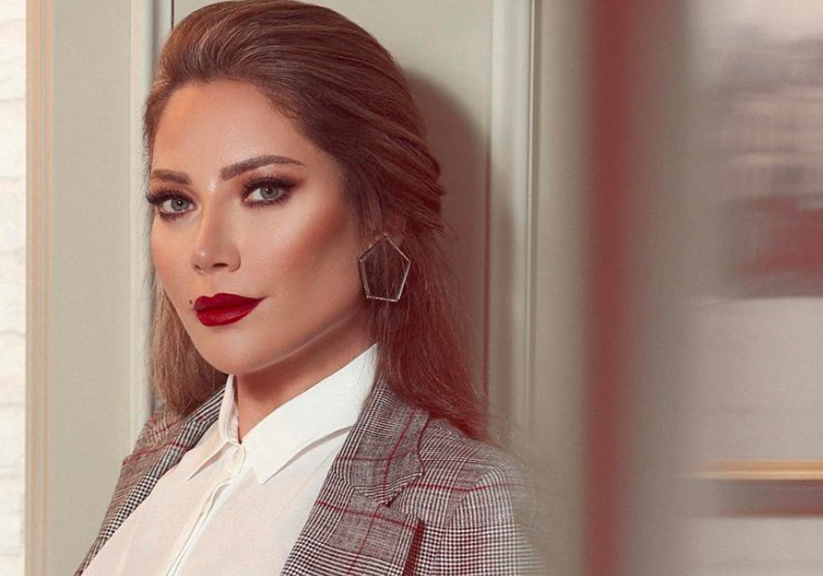 سلافة معمار تعيد نشر صورتها مستعملة الفوتوشوب والفرق بين الاثنتين مذهل!